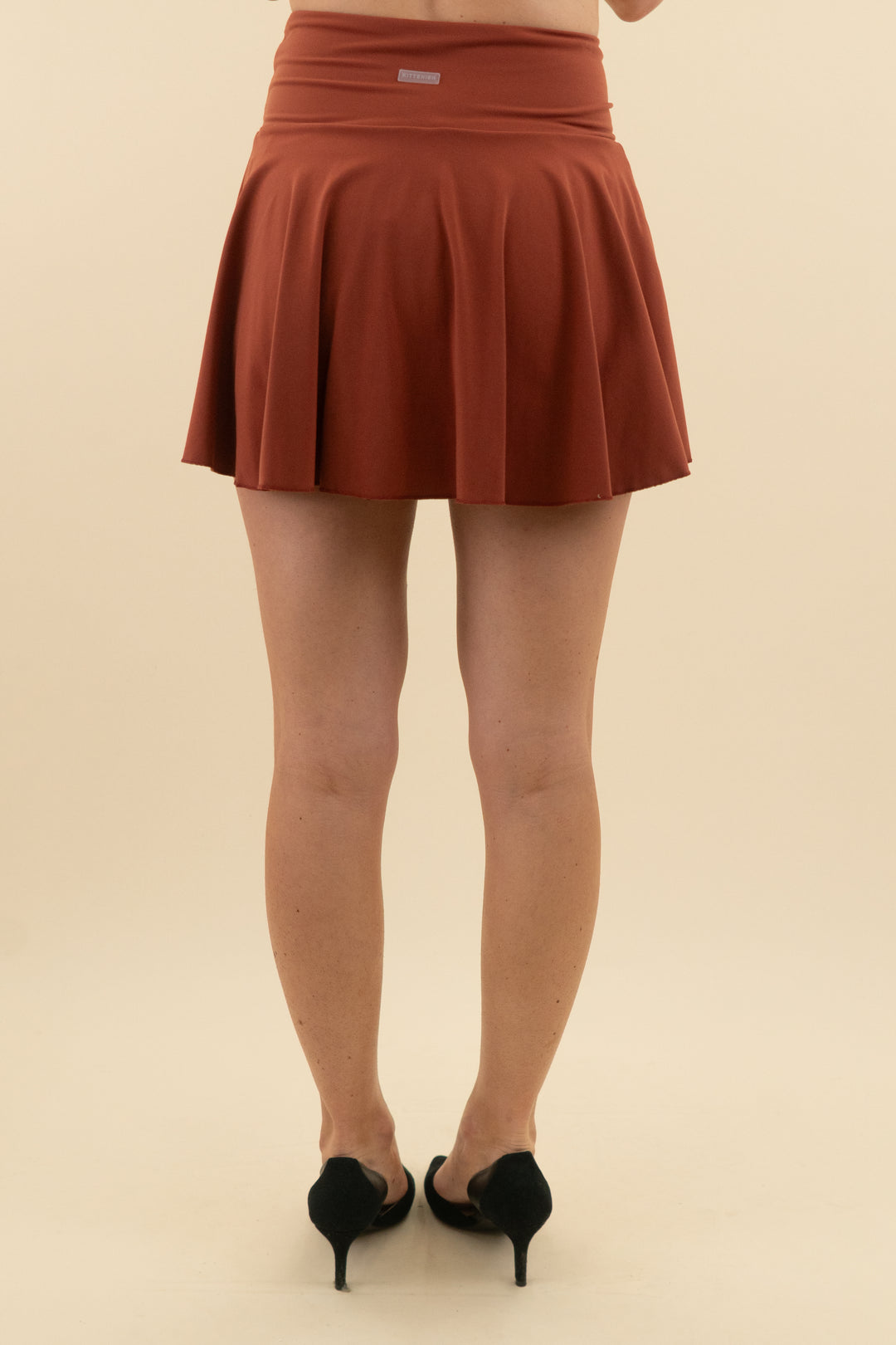 kittenish rust brown tennis skirt (s; retail $78)