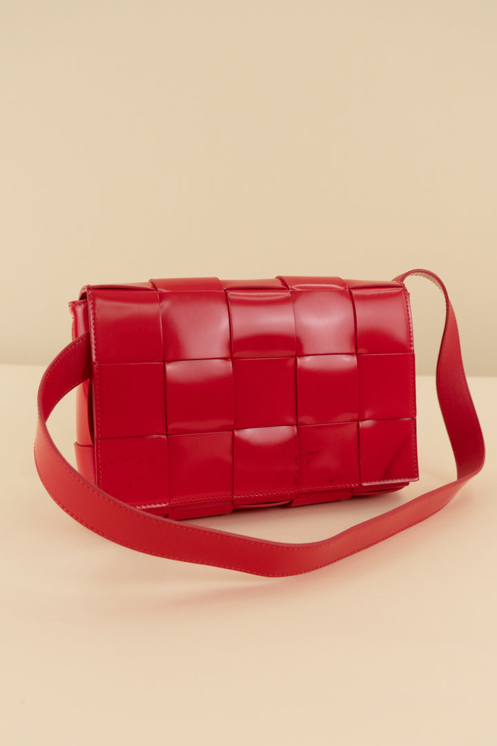 Bottega Veneta red intreccio cassette bag (retail $3,100)