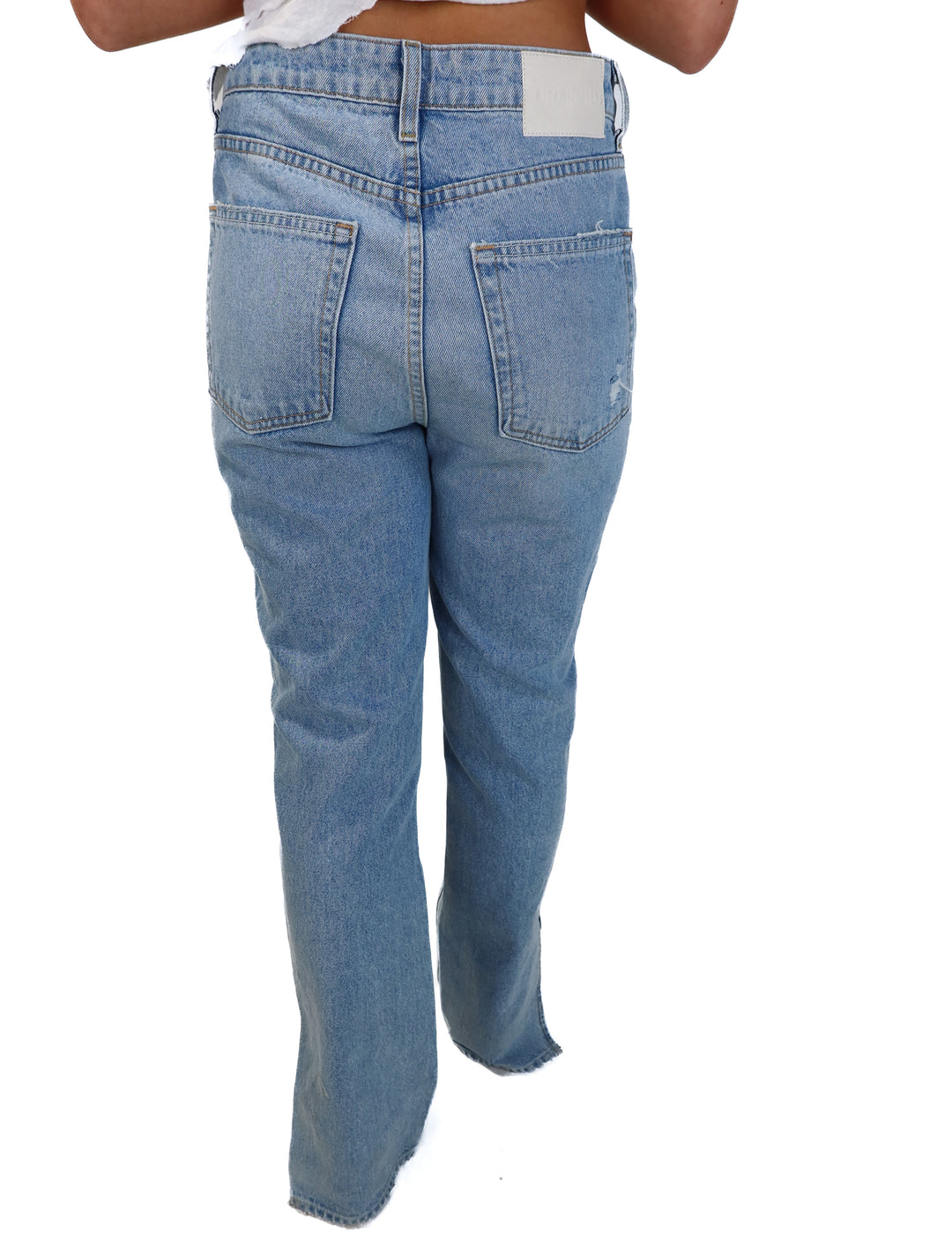 Grlfrnd light wash straight leg jeans (27; retail $225)