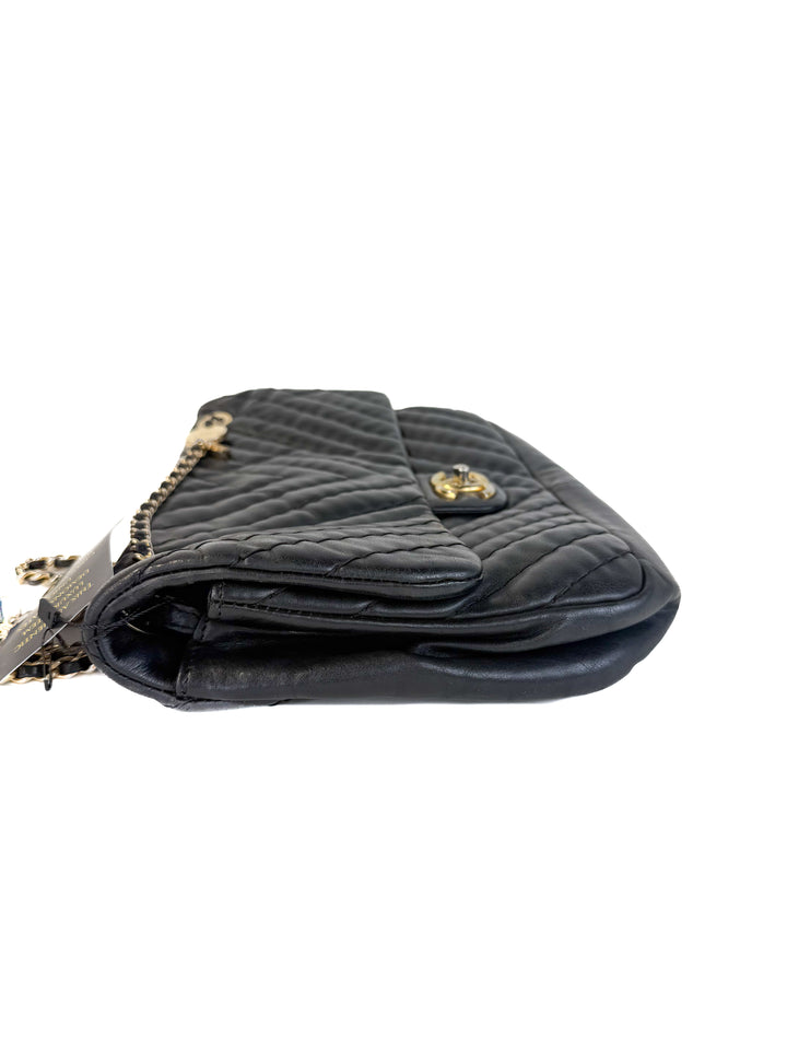 Chanel Quilted Chevron in Black (est. retail today $8,200)