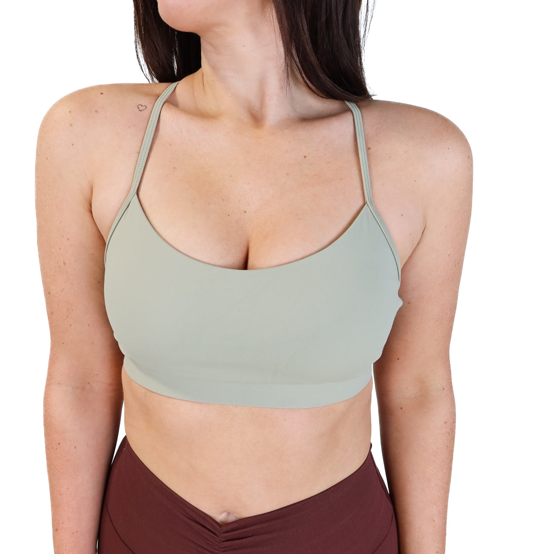 Volare sage green sports bra (M; retail $38)