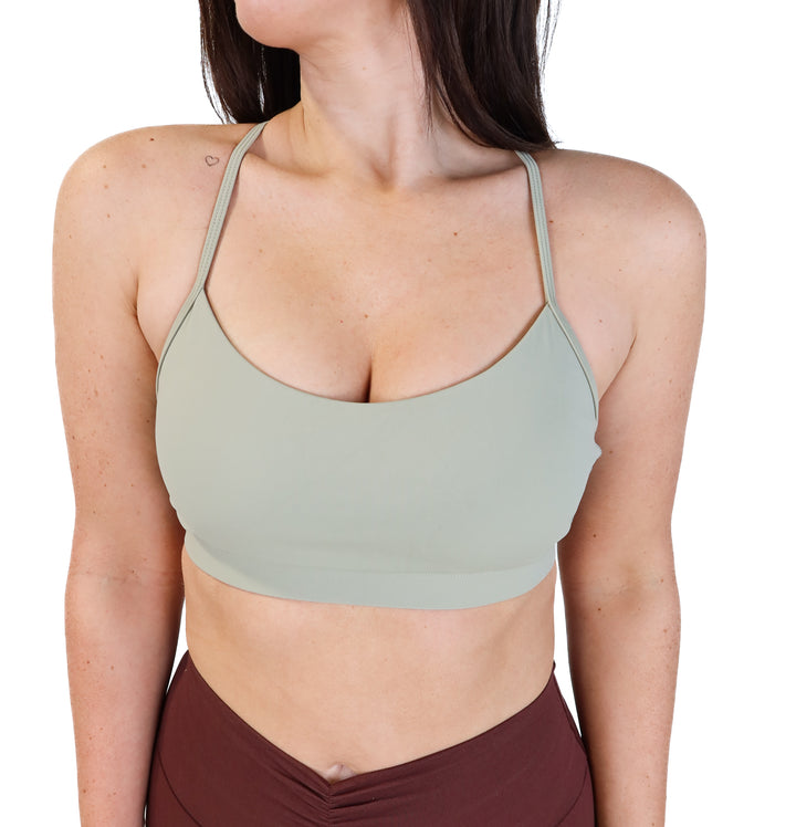 Volare sage green sports bra (M; retail $38)