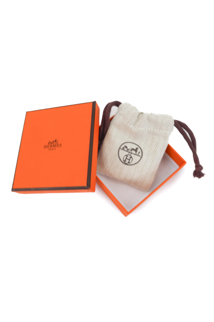 Hermes Clic H Bracelet in black (PM size; retail $810)