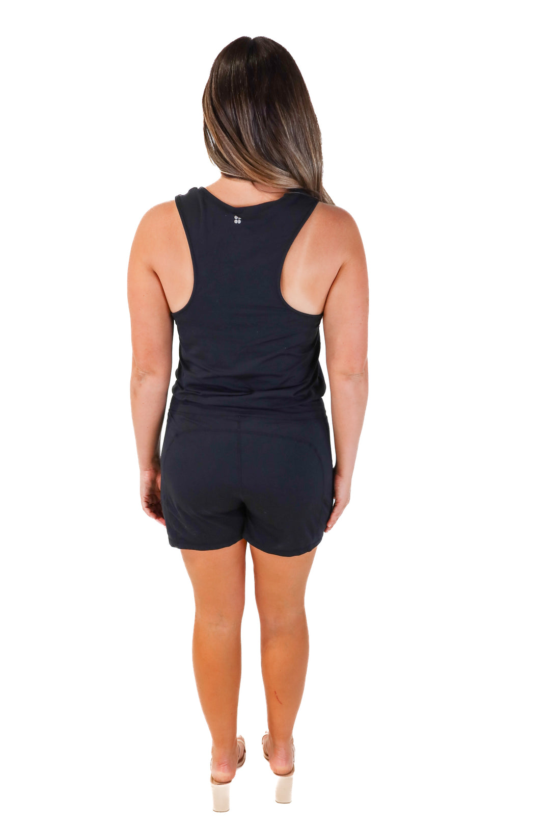 Sweaty Betty black sleeveless romper (M; retail $120)