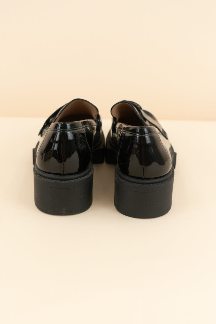 coach black slick chunky loafers (7.5)