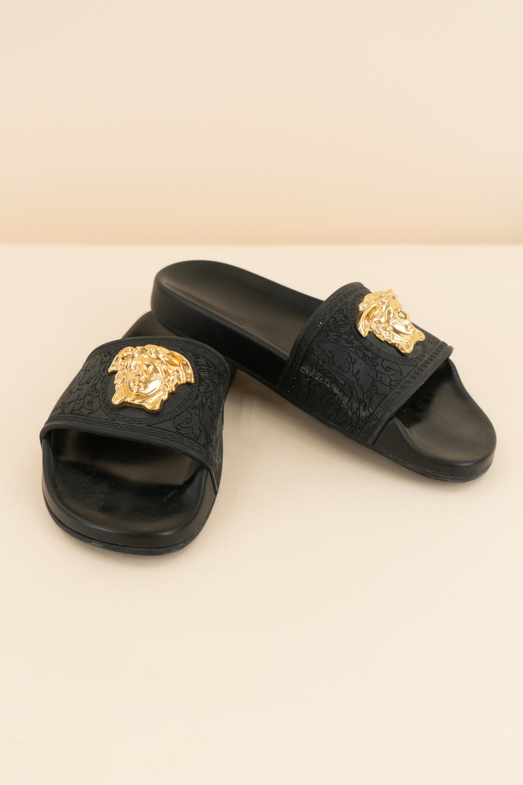 versace black slides with gold emblem (37/ US 6.5-7; retail $495)
