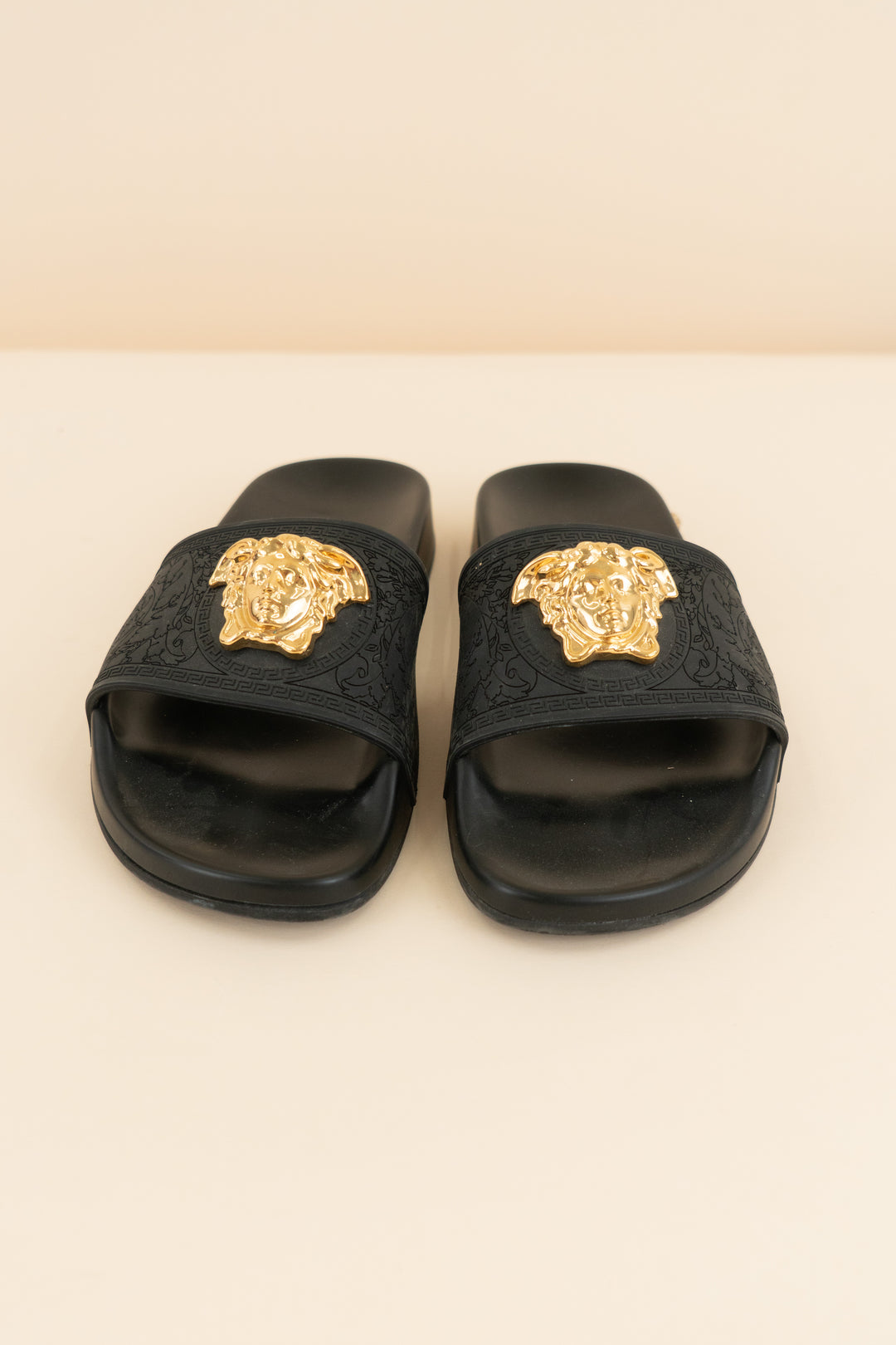 versace black slides with gold emblem (37/ US 6.5-7; retail $495)
