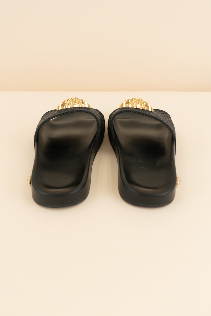 versace black slides with gold emblem (37/ US 6.5-7; retail $495)
