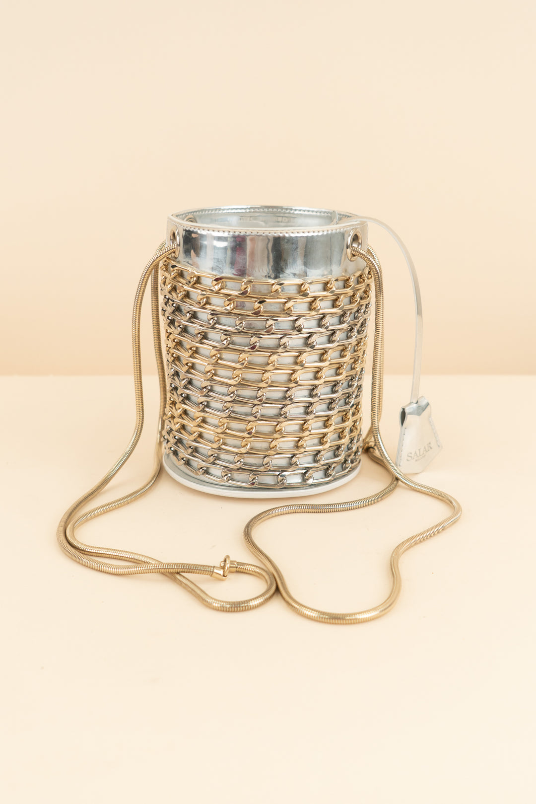 salar milano silver and gold metallic bucket bag with chains