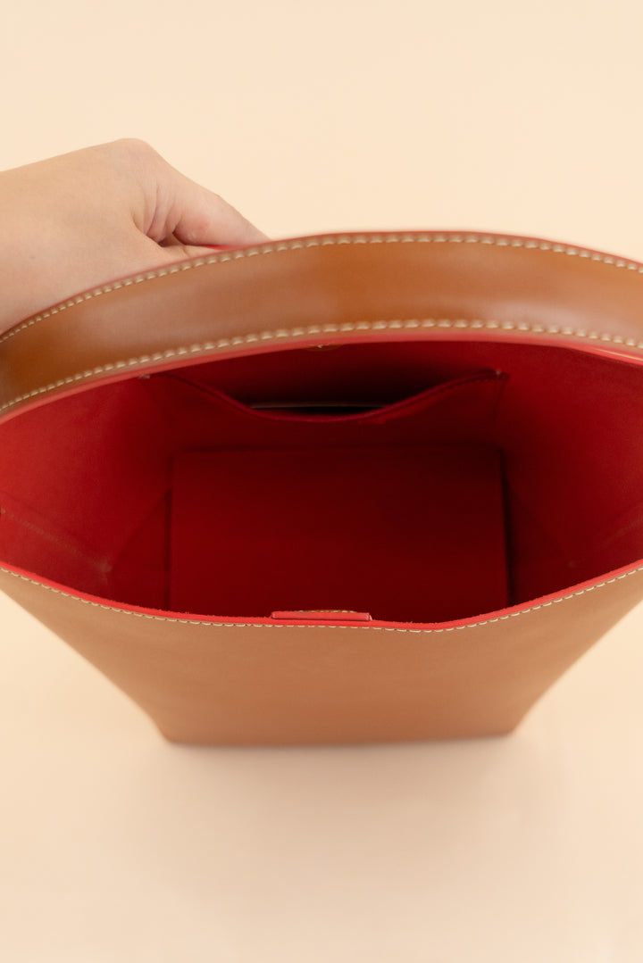 jmclaughlin camel bucket bag w/ orange interior (os; retail $328)