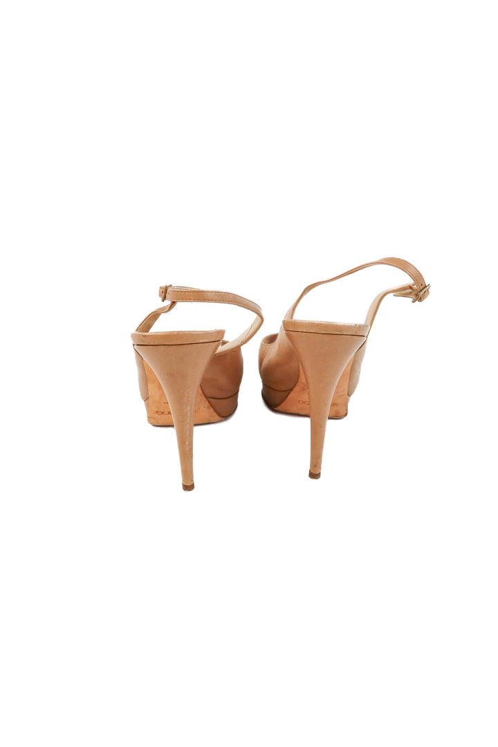Jimmy choo nude platform heels (41; retail $895)