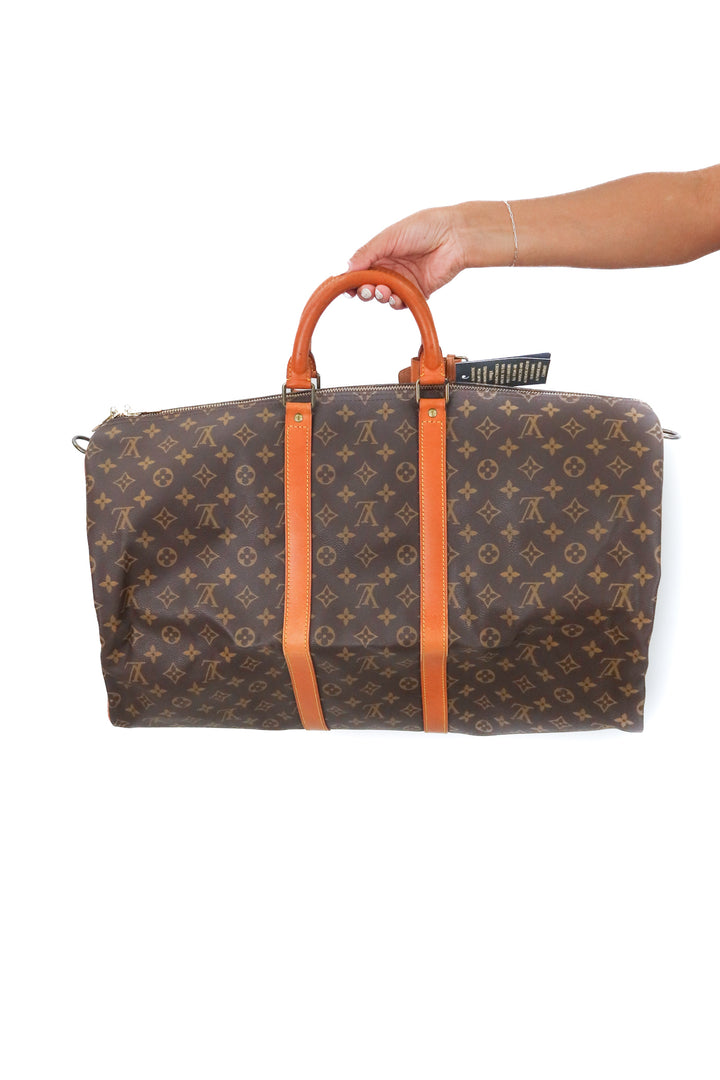 Louis Vuitton Keepall Bandouliere 55 (retail $2,700)