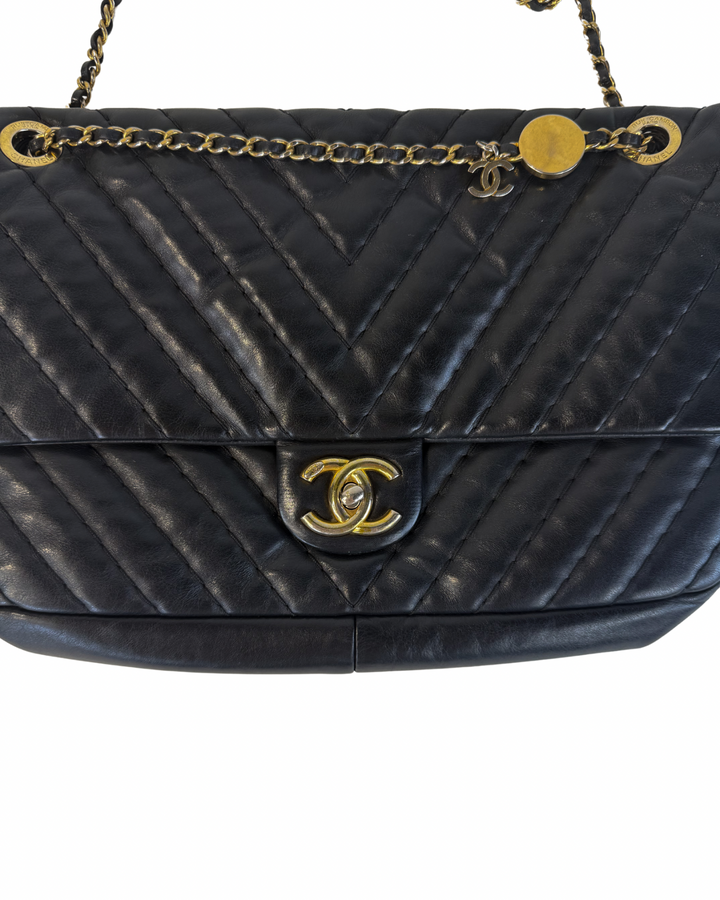 Chanel Quilted Chevron in Black (est. retail today $8,200)