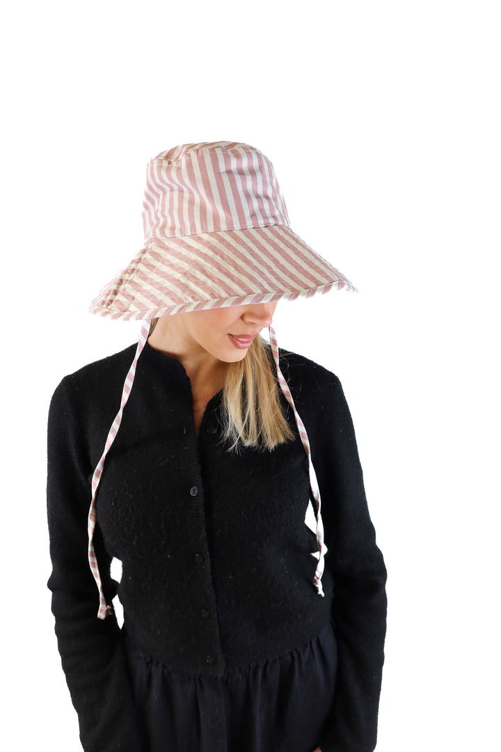Business & pleasure pink/white striped bucket hat (retails for $60)
