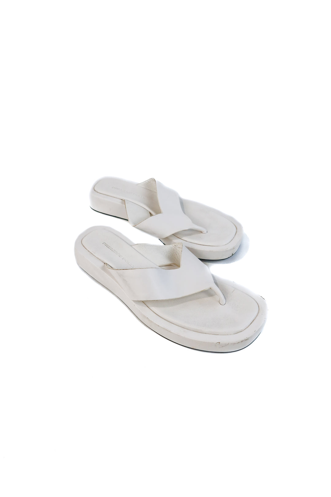 Princess Polly white platform flip flops (8; retails for $59)