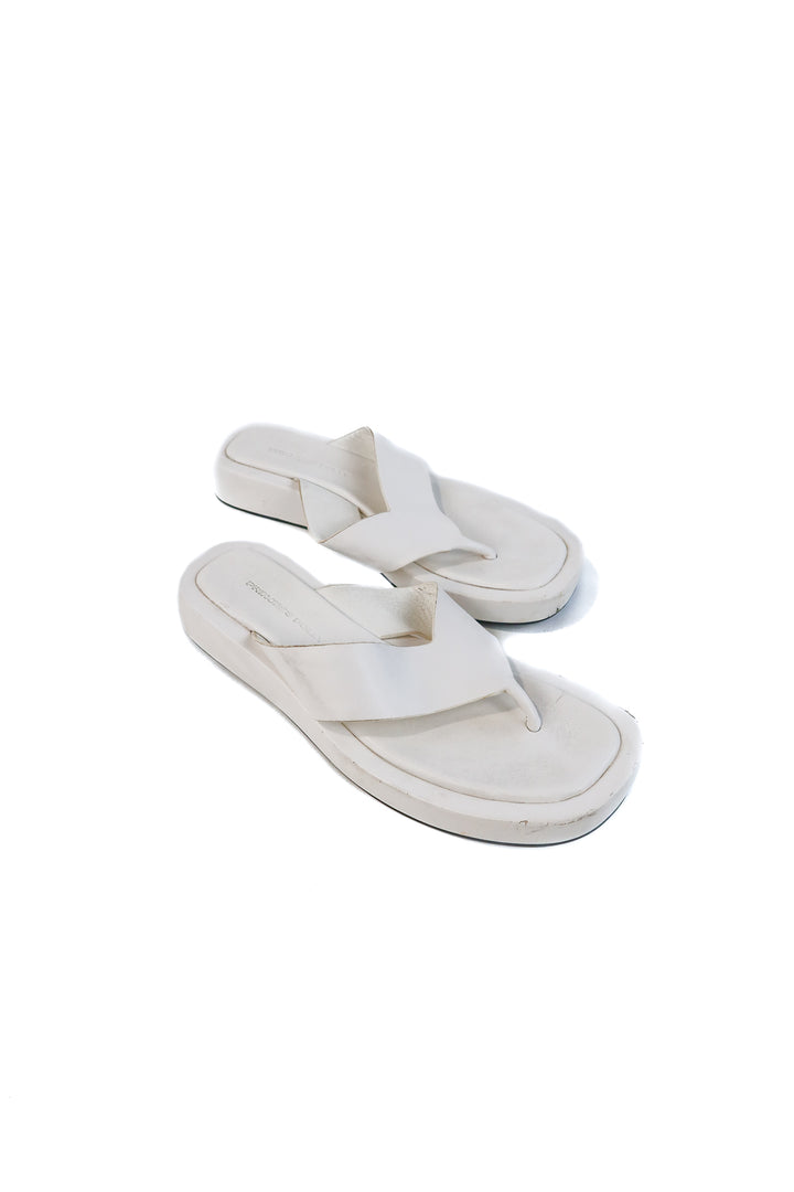 Princess Polly white platform flip flops (8; retails for $59)