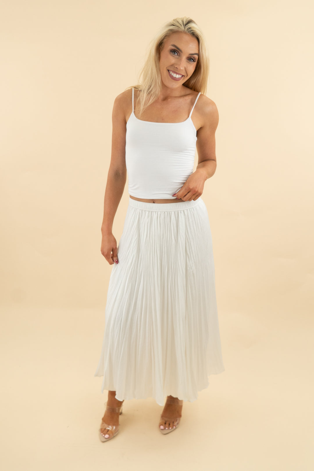 white label white pleated midi skirt (4; retail $495)