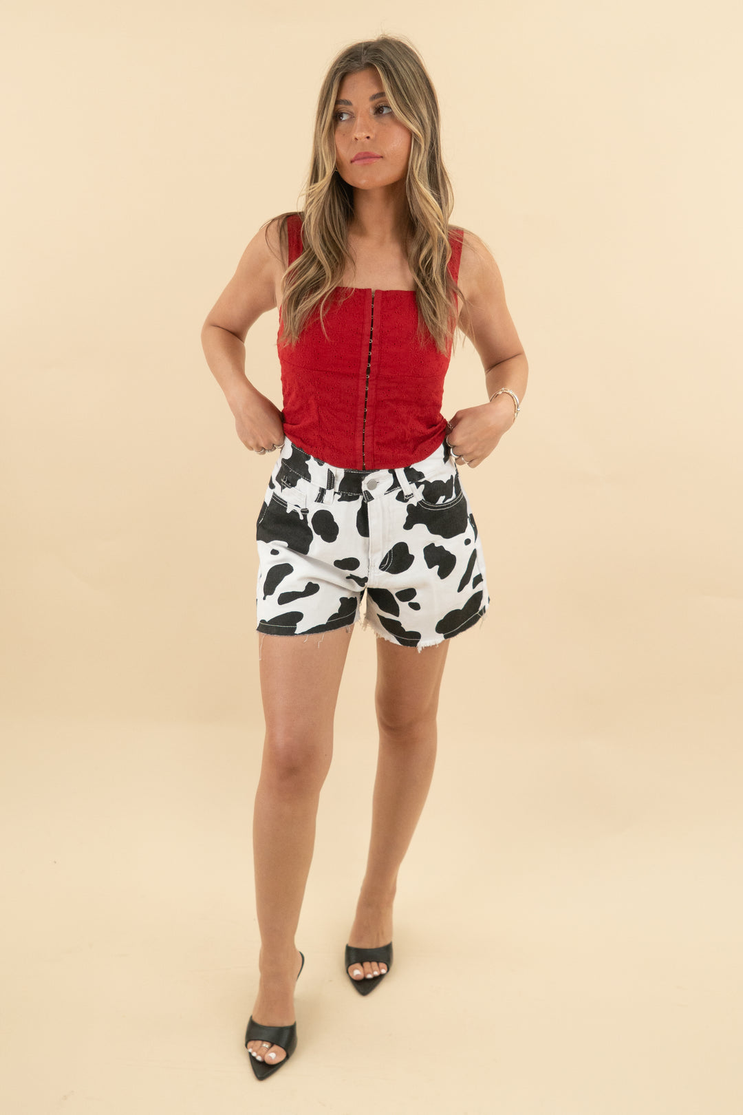 black cow print white denim shorts (s; retail $58)