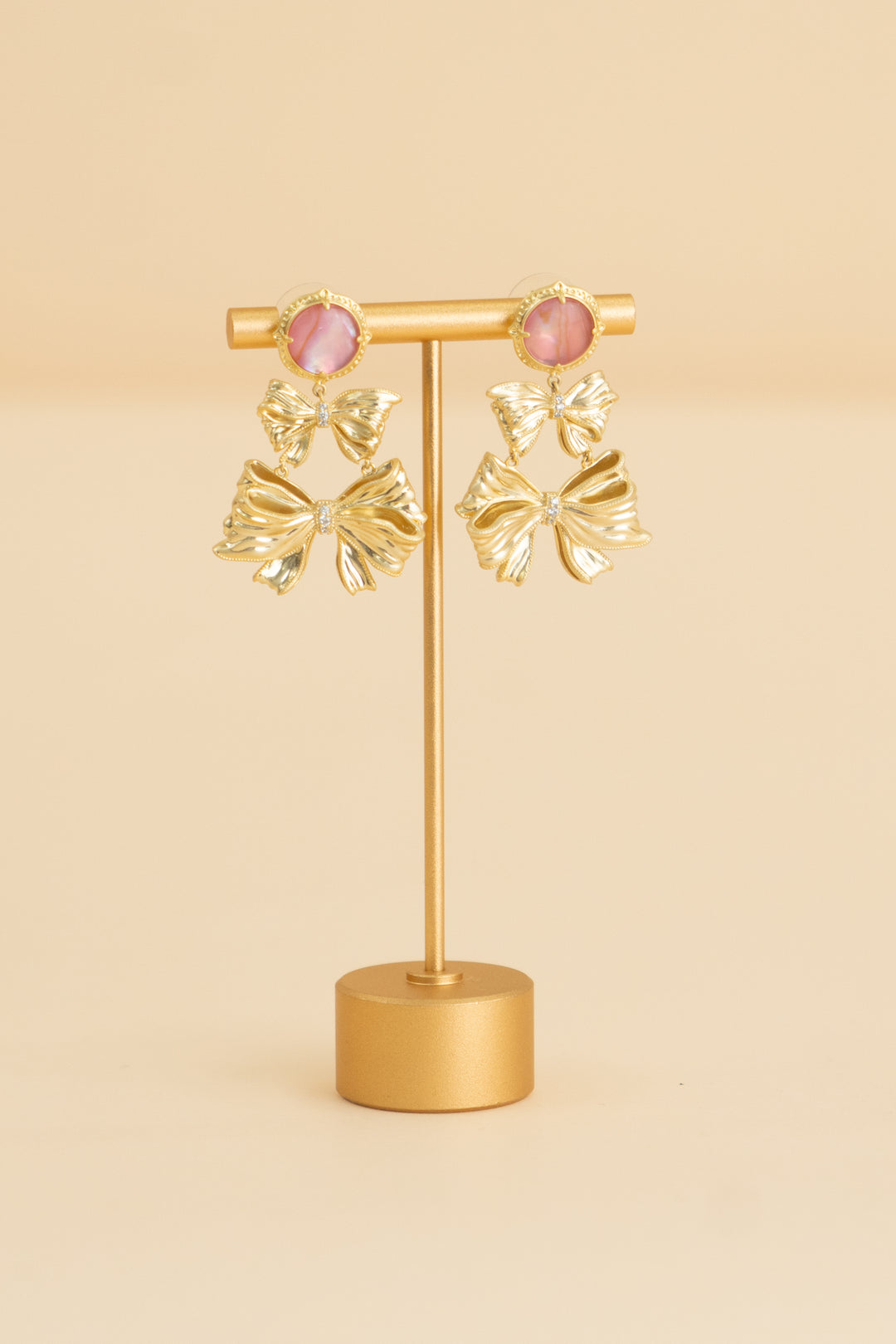 loveshackfancy pink gem gold bow drop earrings