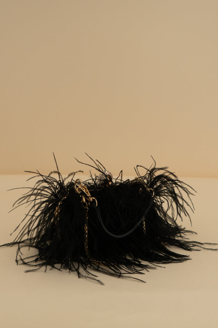 black feather clutch w/ gold chain strap