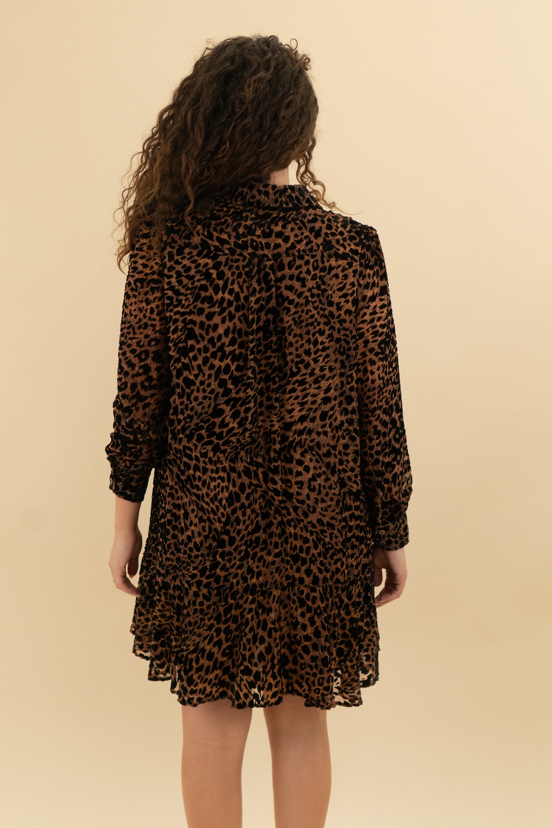 tuckerneck long sleeve leopard mini dress (s)