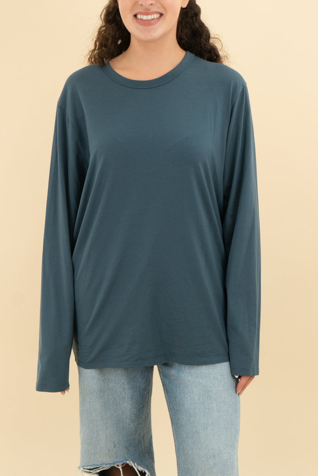 Peacock blue long sleeve athletic top