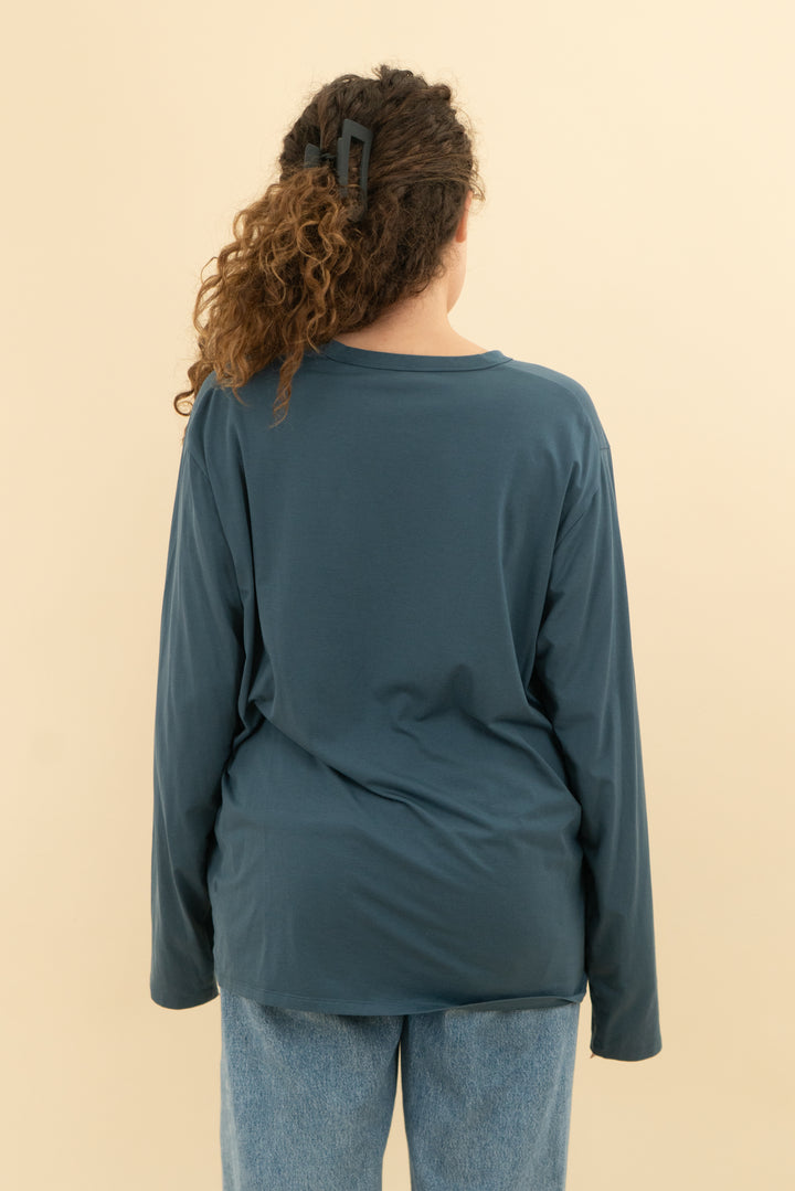 Peacock blue long sleeve athletic top