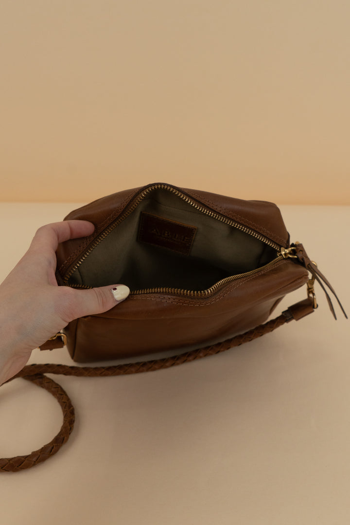 able brown crossbody with braided strap (os)