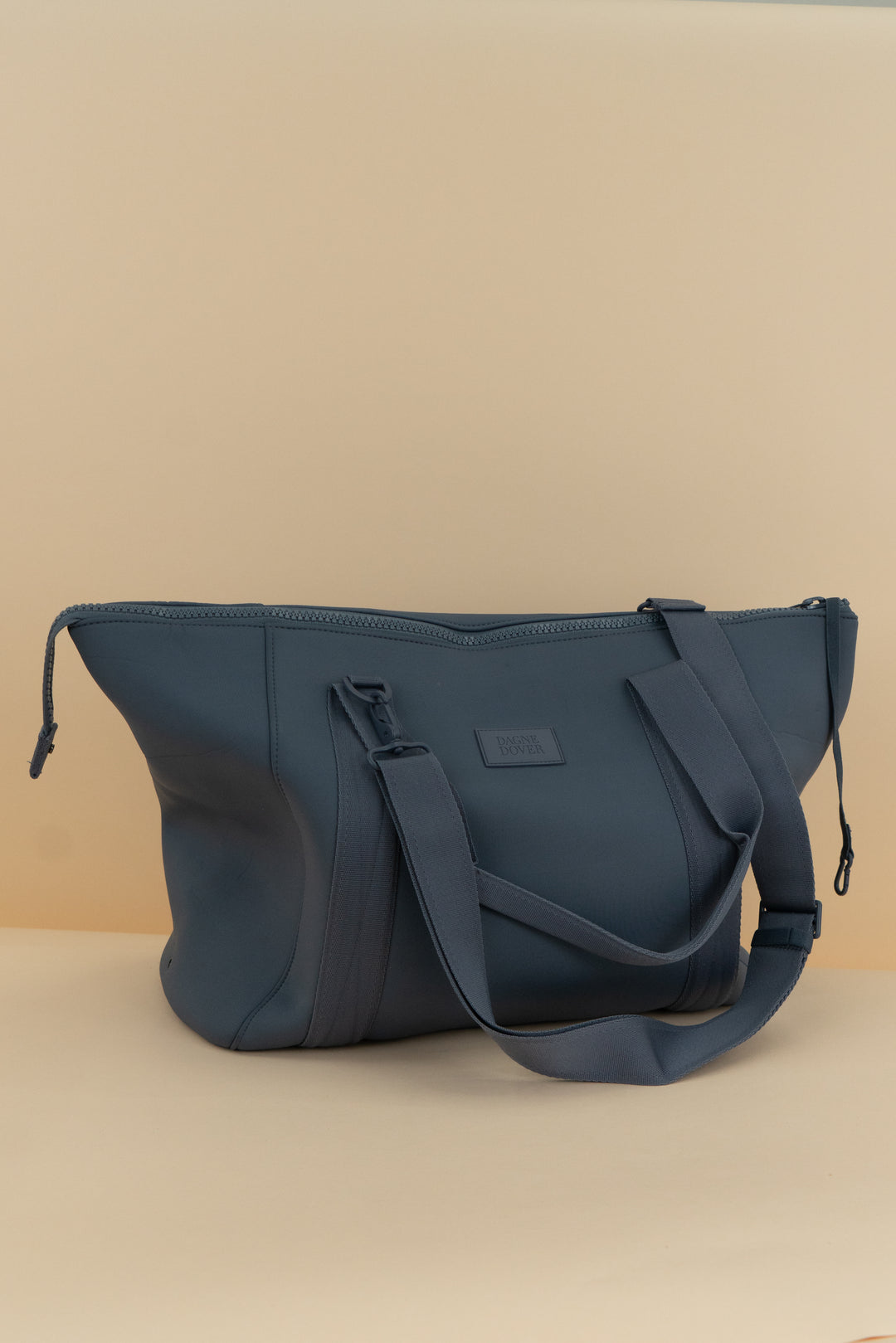 dagne dover steel blue neoprene bag