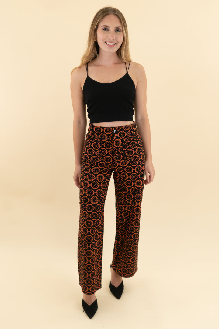 maeve  the colette pants black with orange flowers (25; retail $138)