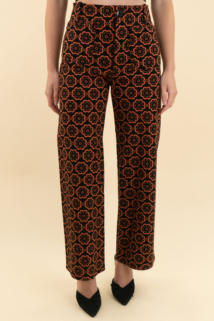 maeve  the colette pants black with orange flowers (25; retail $138)