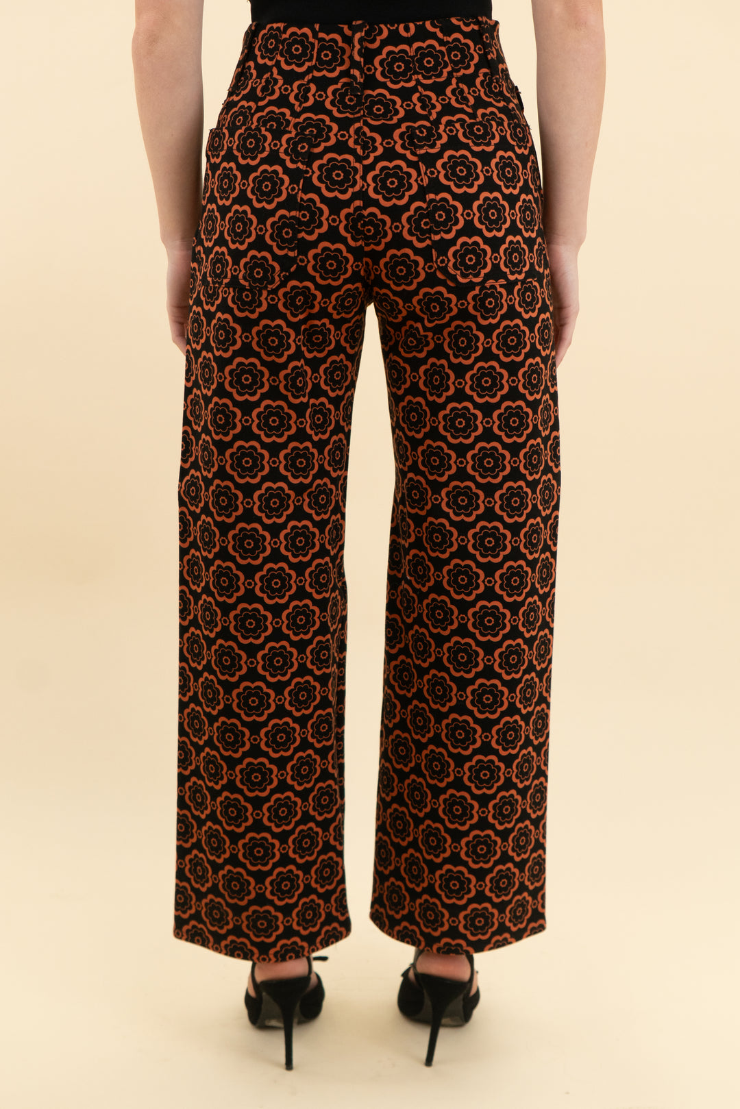 maeve  the colette pants black with orange flowers (25; retail $138)