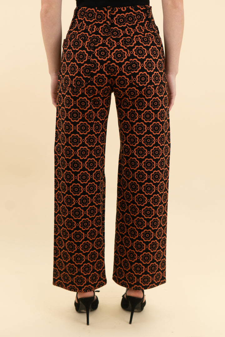 maeve  the colette pants black with orange flowers (25; retail $138)