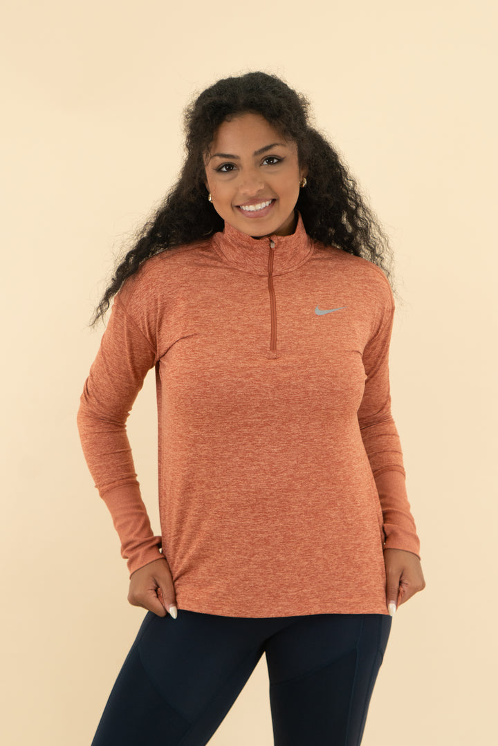 nike burnt orange pullover (s)
