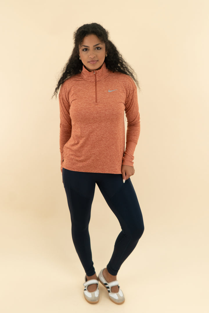 nike burnt orange pullover (s)