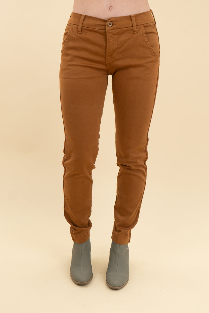 nsf rust brown skinny jeans (24; retail $350)