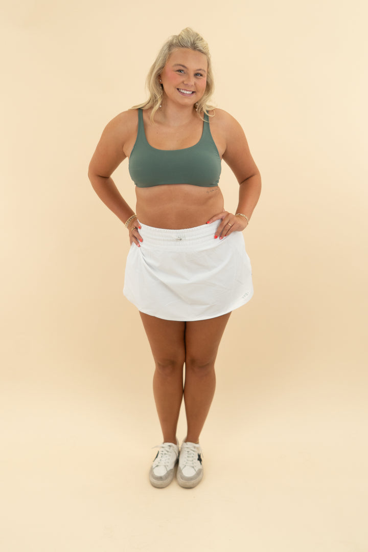 vuori sage green sports bra (l)