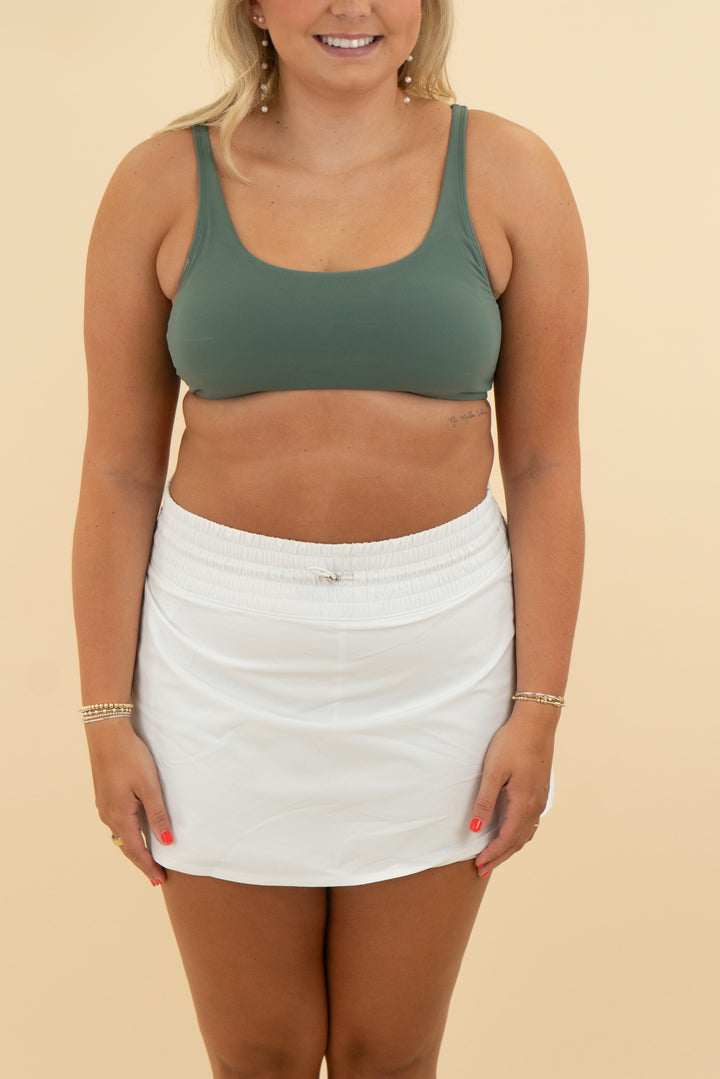 vuori sage green sports bra (l)