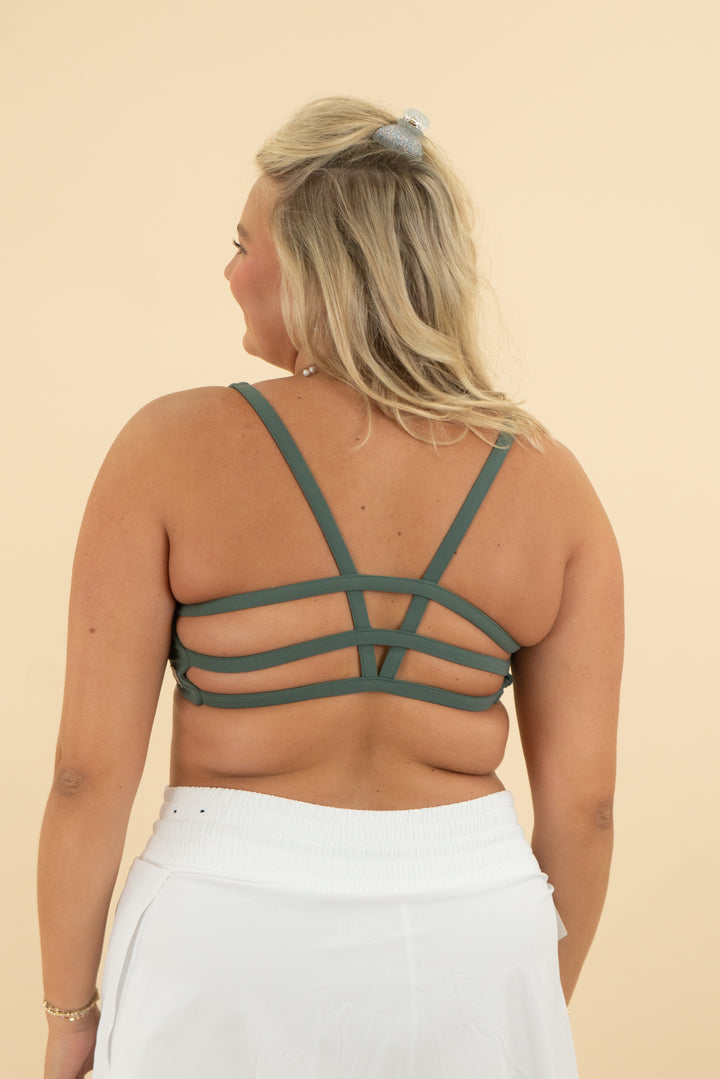 vuori sage green sports bra (l)