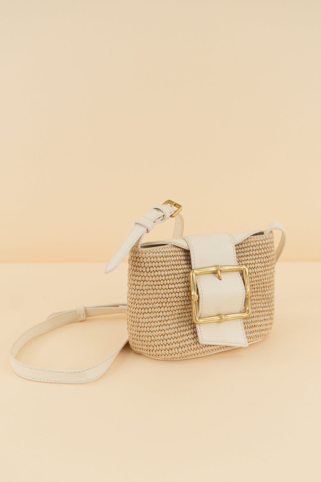 dolce vita cream/tan weave crossbody bag