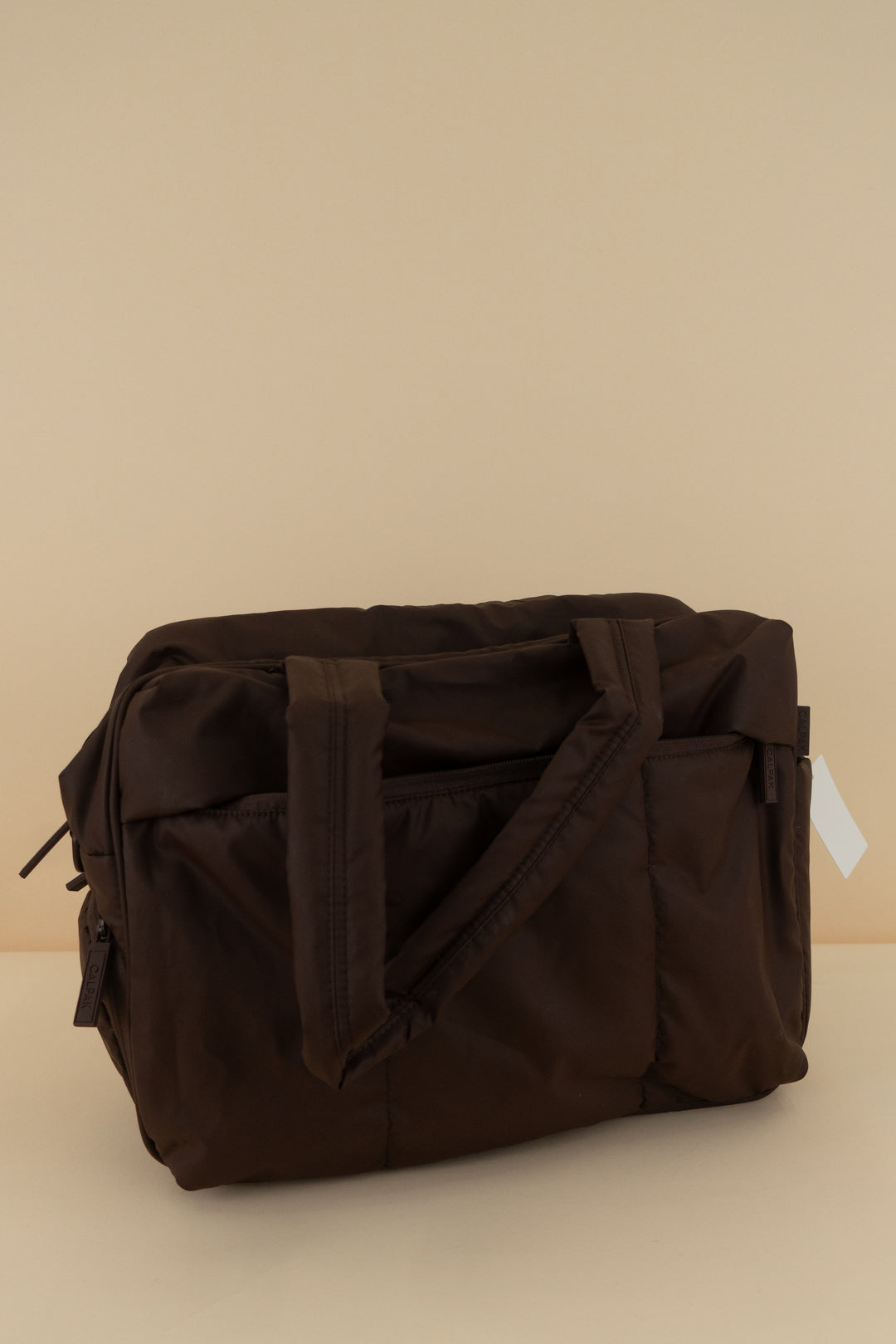 calpak brown luka duffel
