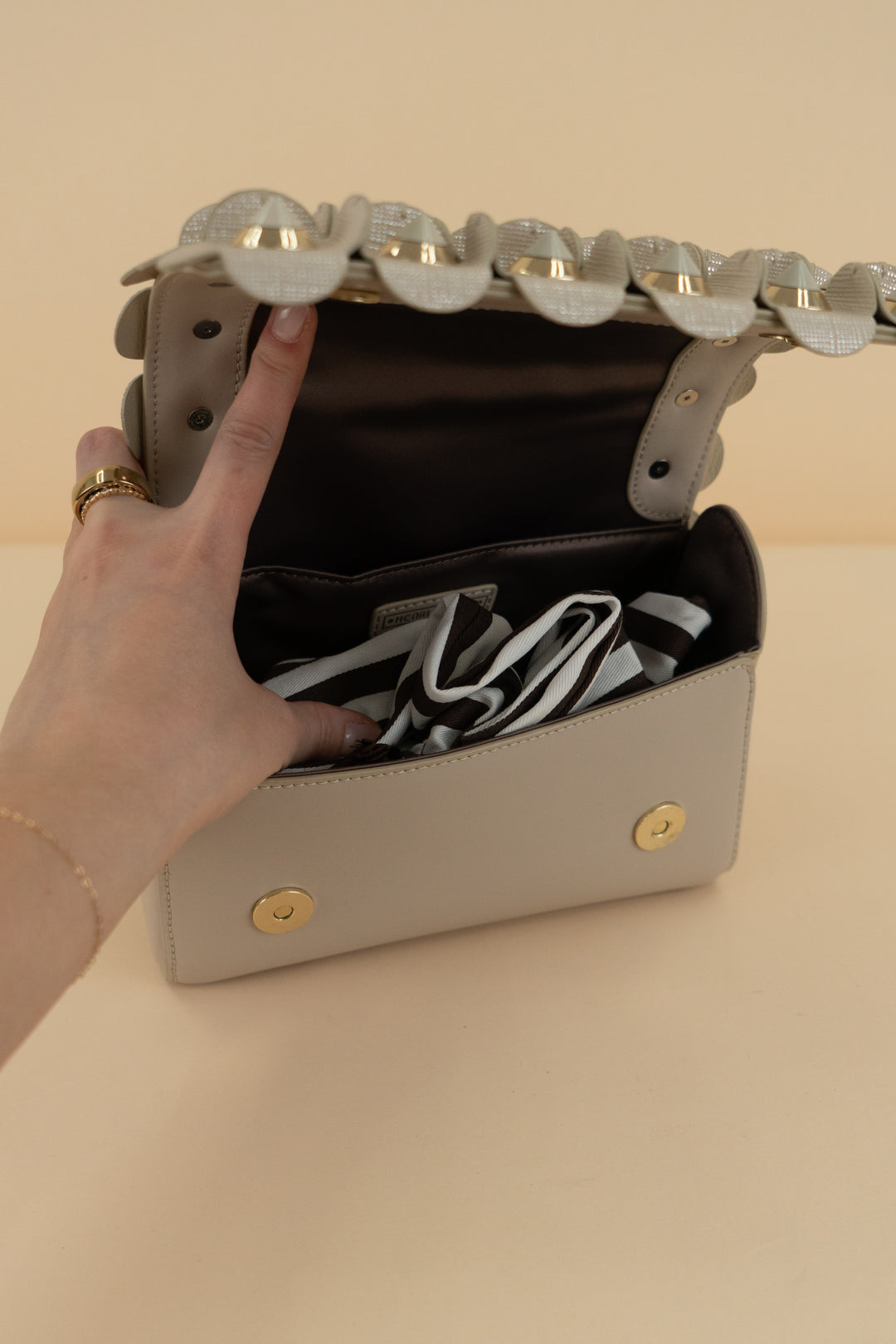 henri bendel taupe studded handbag