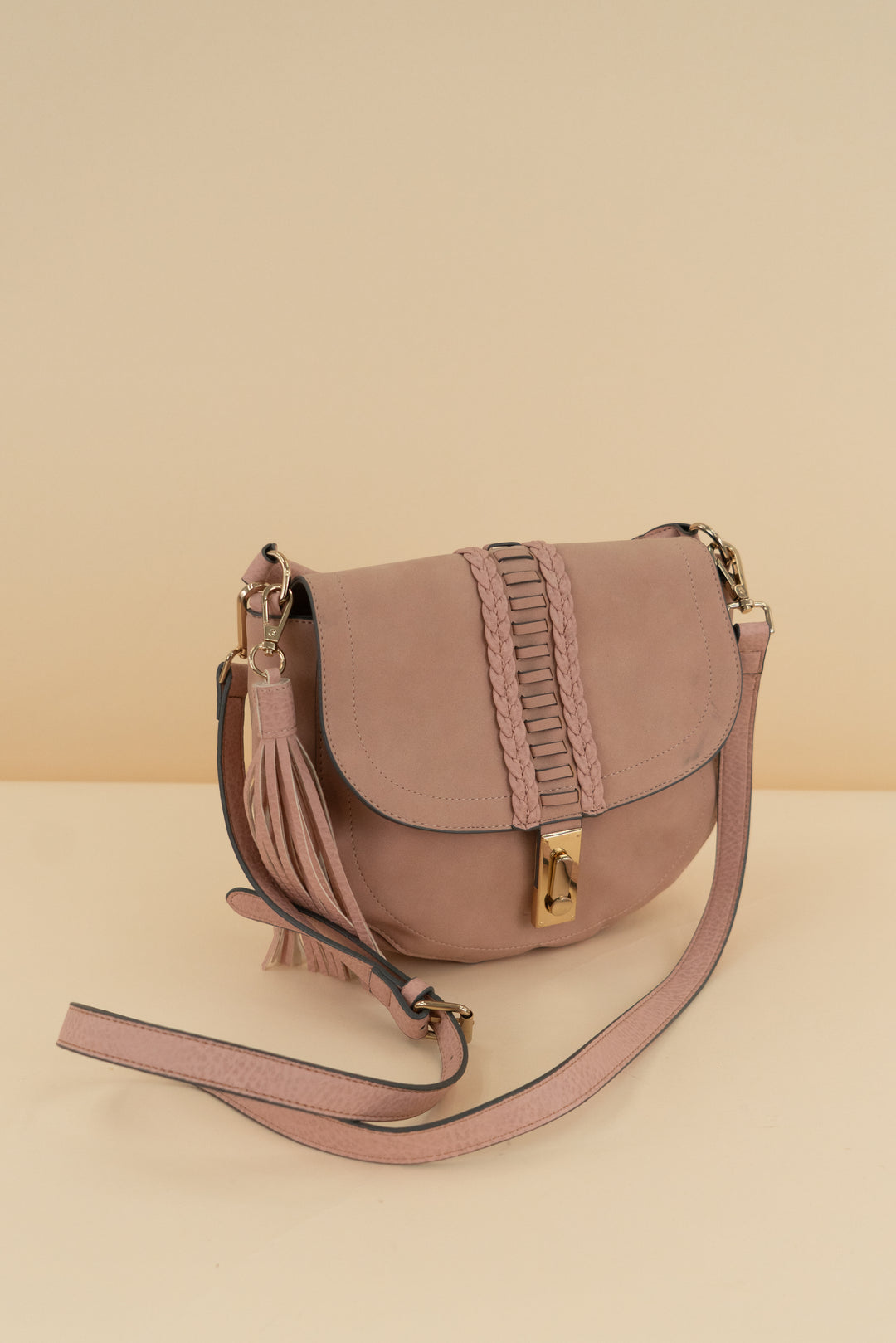 pink suede purse with tassel (os)