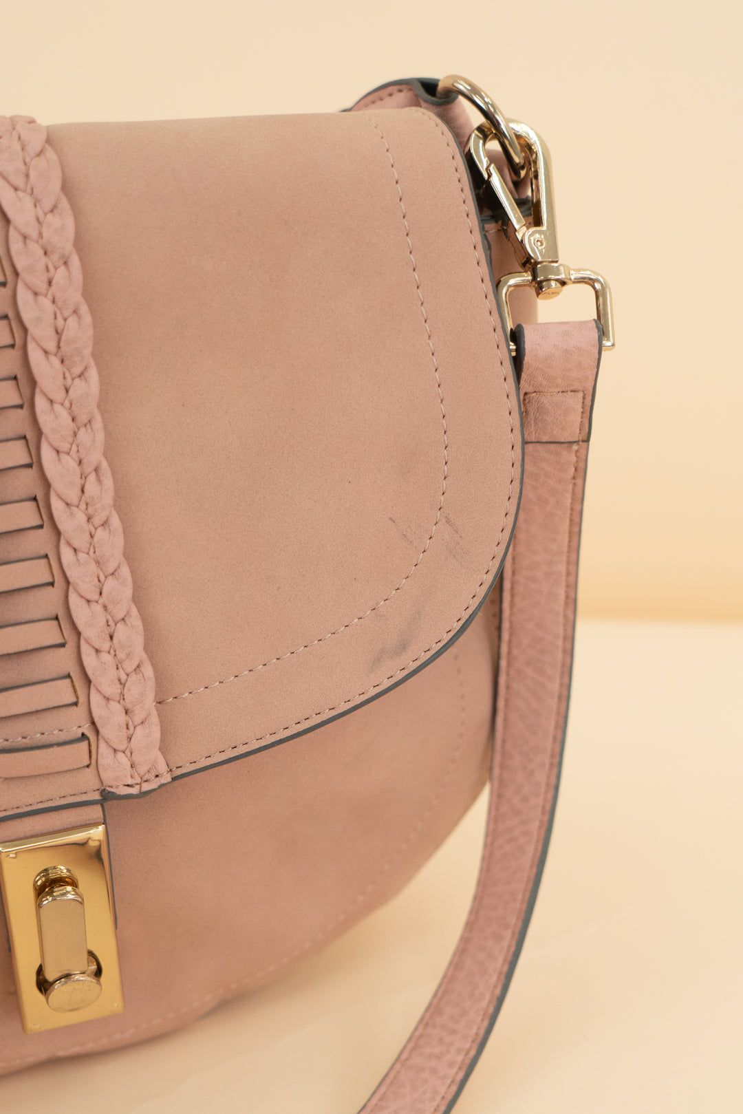 pink suede purse with tassel (os)