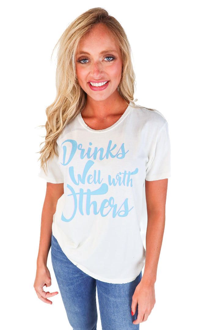 SOLD: Cream "Drinks Well With Others" Graphic Tee (M)