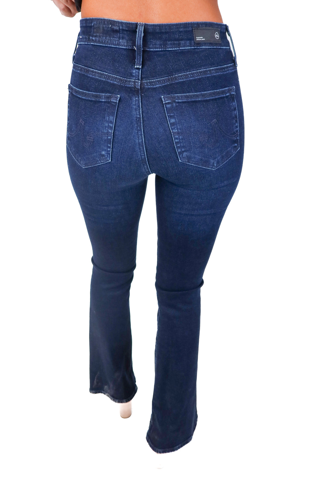 AG dark wash bootcut jeans (25; retail $225)