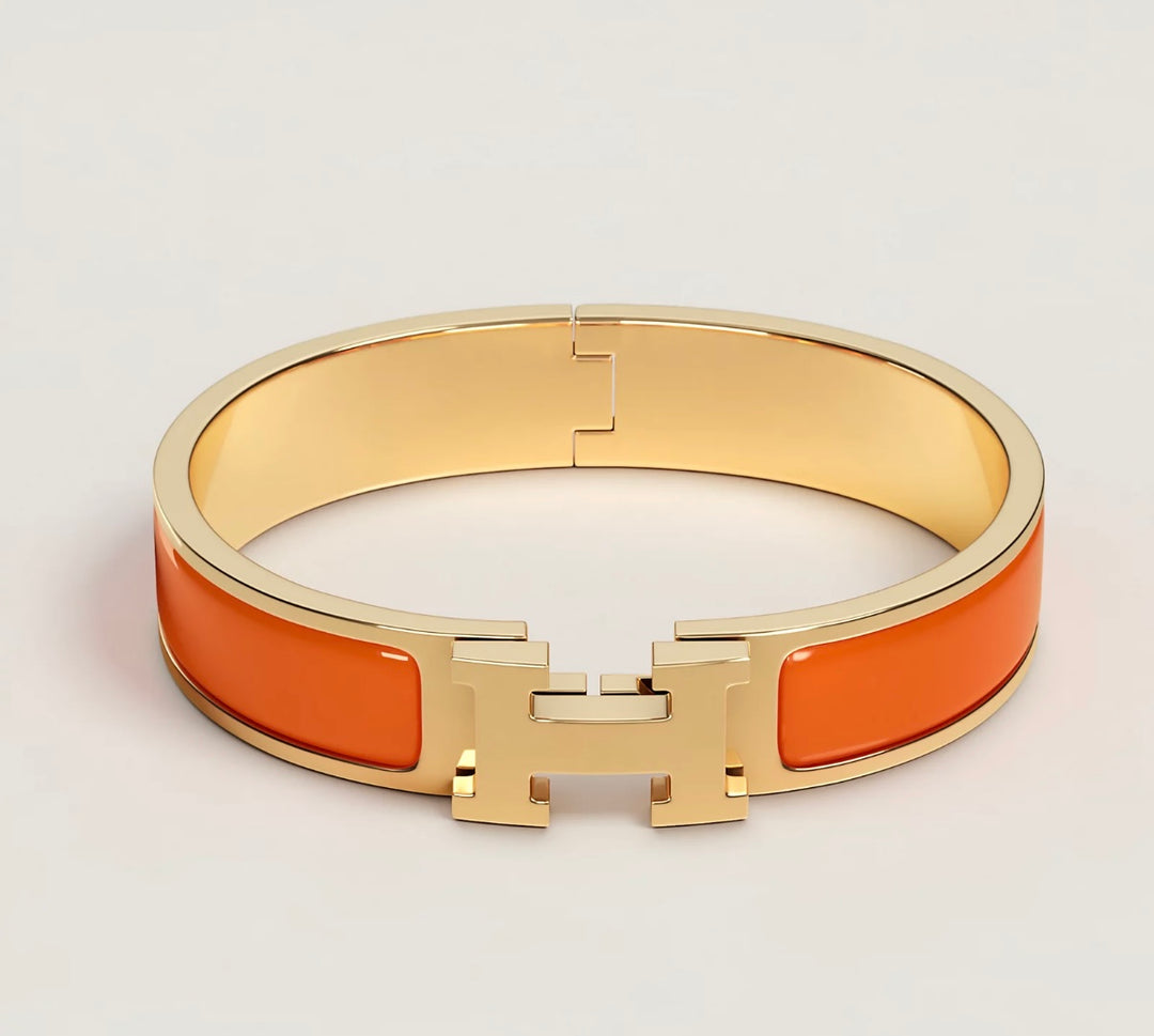 Hermes orange Click H Bracelet NWOT (retail $770)