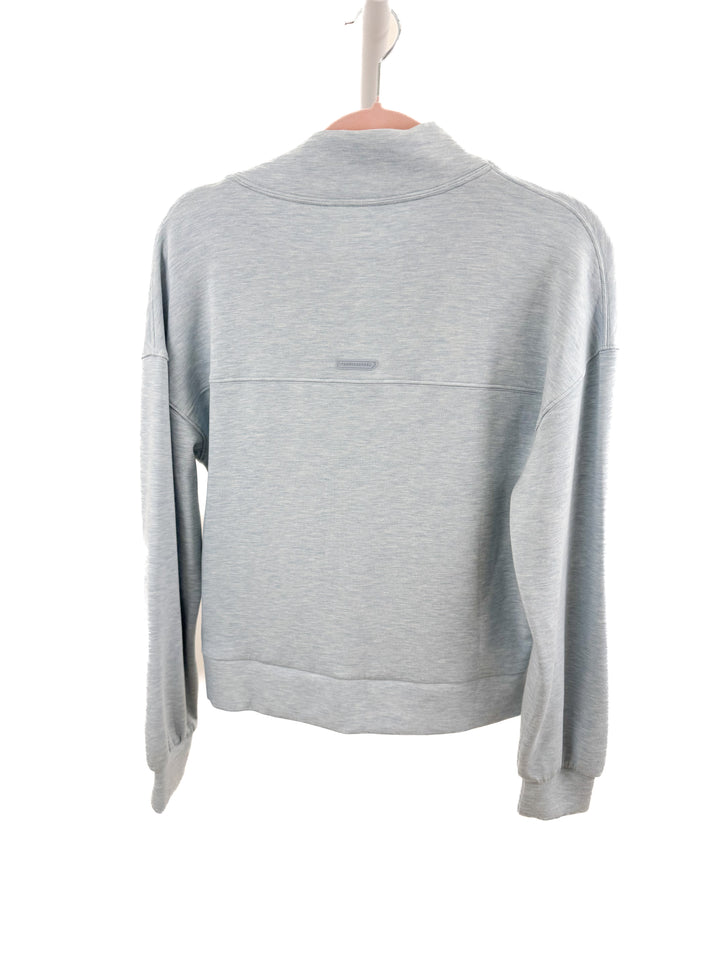 Travis Mathew light blue zip-up (XS)