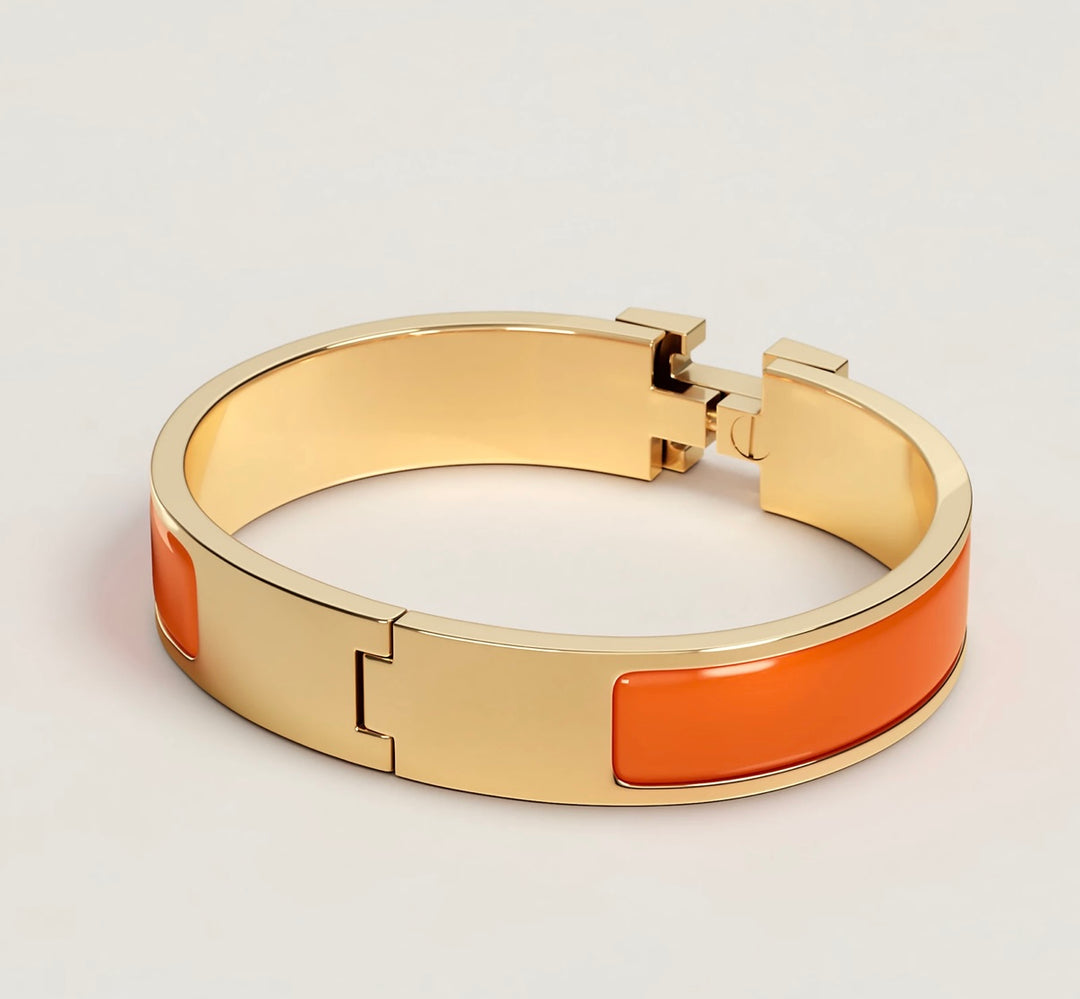 Hermes orange Click H Bracelet NWOT (retail $770)