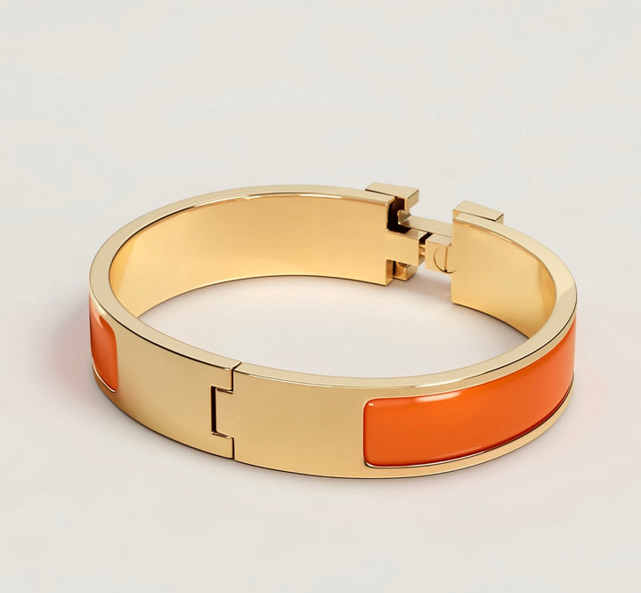 Hermes orange Click H Bracelet NWOT (retail $770)